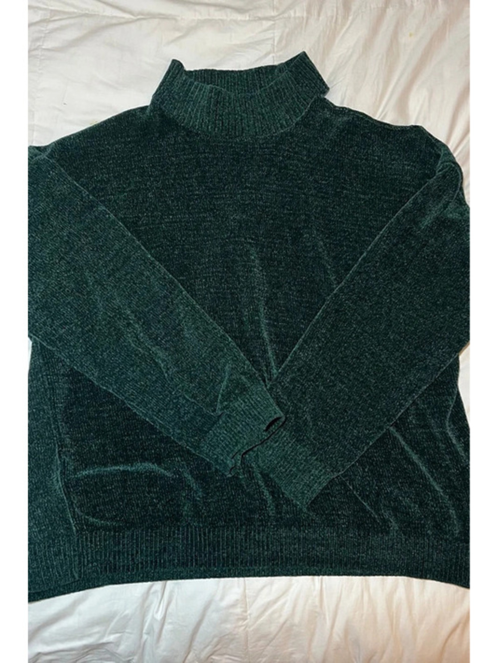 Dark green velvet sweater with shoulder opening